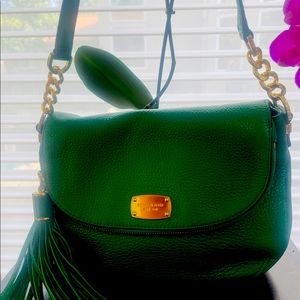 Michael Kors Green “Bedford” flap tassel crossbody.